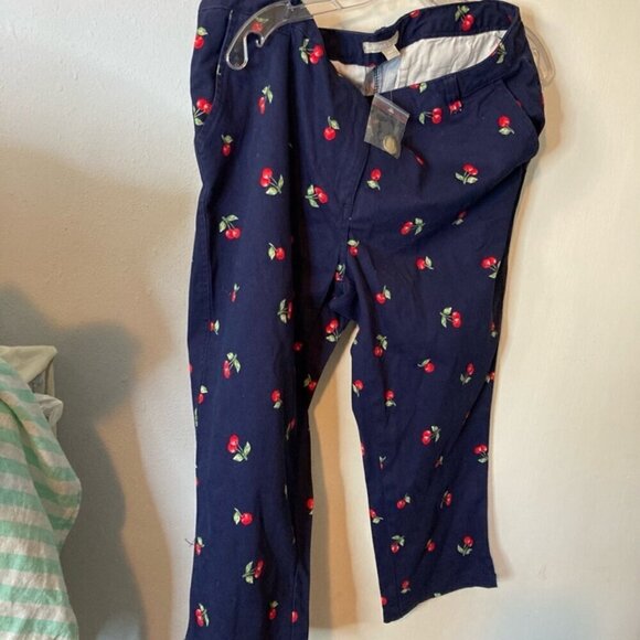 Woman within navy capris with embroidered red cherries - Picture 1 of 3